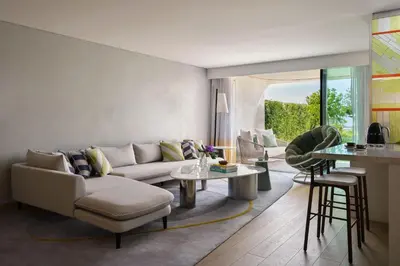 a living room with a couch and a table at W Residences Algarve in Albufeira