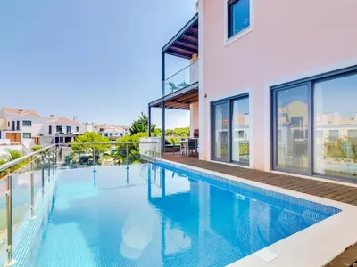 an image of a swimming pool in a house at Vale do lobo, 'Golf by the Pool' 2 bedroom apartment in Vale do Lobo