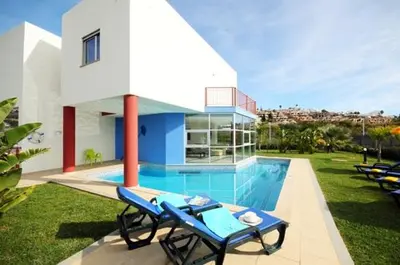 a living room with a couch and a table at Marina Sol by Atlantic Places in Albufeira