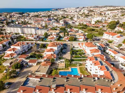 an aerial view of a town with houses at Santa Eulália 2-Bedroom Apartment - Swimming Pool - Wifi in Albufeira
