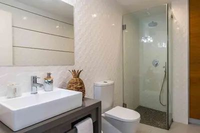 a bathroom with a sink and a toilet and a shower at Santa Eulália 2-Bedroom Apartment - Swimming Pool - Wifi in Albufeira