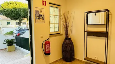 a room with a fire hydrant and a vase on the wall at Mosqueira by Check-in Portugal in Albufeira