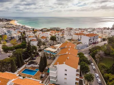 an aerial view of a city and the ocean at Casa Santa Maria - Sea View - 500m from the Beach - WiFi in Albufeira