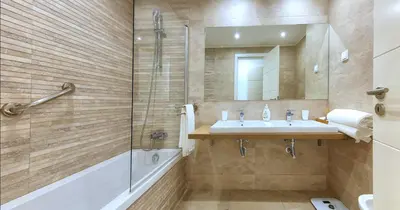 a bathroom with a sink and a shower at Victory Village 20B in Quinta do Lago