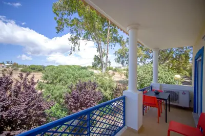a view from the balcony of a house with a table and chairs at ALFELI-AP in Olhos de Água