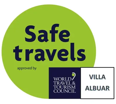 a green circle with the words safe travels and world travel tourism council at Villa Albuar in Patroves