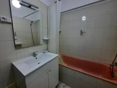 a bathroom with a sink and a bath tub at Casa Oceano 1Bedroom apartment W/sea view in Quarteira