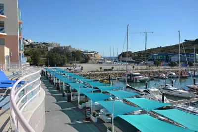 a group of boats docked at a marina at Wonderful Apartment Albufeira Marina 4B 2B in Albufeira