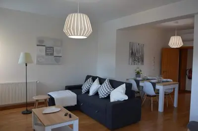 a living room with a couch and a table at Wonderful Apartment Albufeira Marina 4B 2B in Albufeira