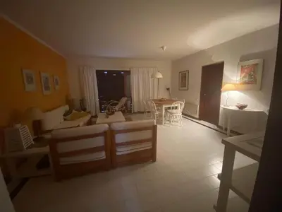 a living room with a couch and a table at T2 sobre a praia - Albufeira/Olhos de Água in Albufeira