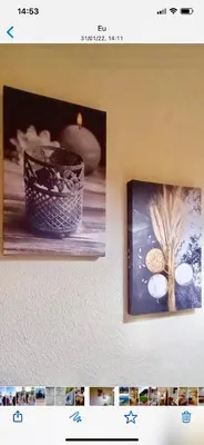 a picture on a wall with two pictures on it at ALDEIA DAS AÇOTEIAS VILLAGEs in Albufeira