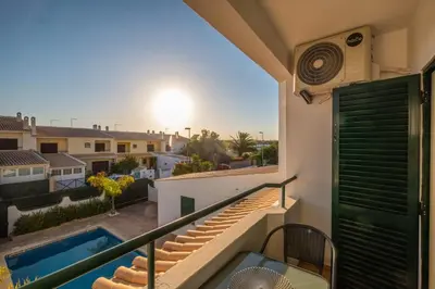 a view from the balcony of a house with a swimming pool at Villa Sequeira - Private Pool - Free WIFI - BY BEDZY in Albufeira