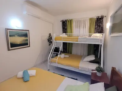 a small room with two bunk beds in it at Blue Algarve in Albufeira