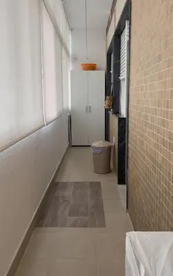 a hallway with a toilet in a room at Casa AL Reis in Faro