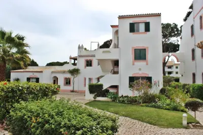 a view of the house from the garden at Golf Apartment - Solar do Golfe Condominium in Vilamoura