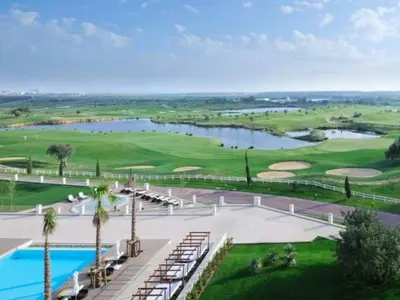 an aerial view of a golf course with a pool at Villa Cascata, 3 bedroom, Pool, close to Olhos de Agua in Albufeira