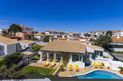 an aerial view of a villa with a swimming pool at Villa Pinheiro Oura by Villa Plus in Albufeira