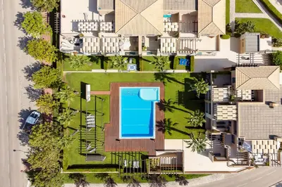 an overhead view of a house with a swimming pool at Apartamento Janelas Oceano - Vilamoura in Quarteira