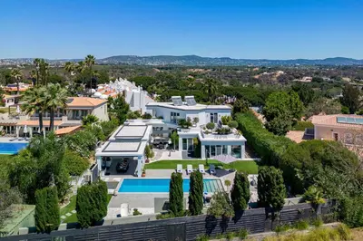 an aerial view of a house with a swimming pool at Villa Allegra - Quinta do Lago in Almancil