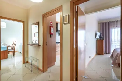 a light on the ceiling of a room at BnB Homes Ocean view Apartment with panoramic Terrace, 2 Swimming pools & Tennis court in Albufeira