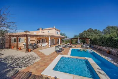 a home with a swimming pool and a house at Stunning Countryside Villa w Private Garden & Pool in Alte