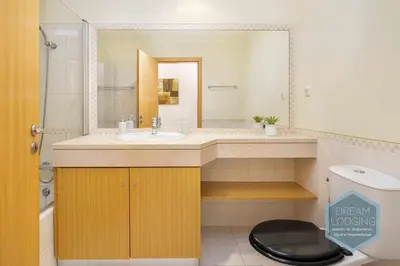 a bathroom with a sink and a toilet at Vista das Ondas 02B - Dream Lodging in Albufeira