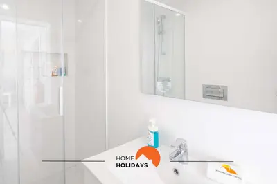 a bathroom with a shower and a sink with a mirror at #097 Casa Antonieta 2 by Home Holidays in Albufeira