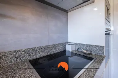 a bathroom with a pool in the middle of a room at #092 Quinta dos Figos by Home Holidays in Albufeira