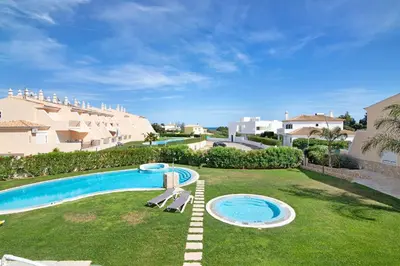 an image of a swimming pool at a villa at Albufeira Townhouse beach in Albufeira