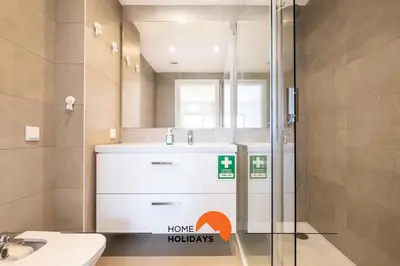 a bathroom with a sink and a shower at #090 Correeira by Home Holidays in Albufeira
