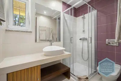 a bathroom with a sink and a shower at Villa Rafaella 3 - Dream Lodging in Albufeira