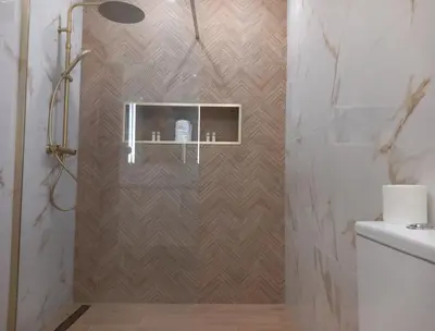 a shower with a glass door in a bathroom at Apartamento Manelito House by Sunyway in Albufeira