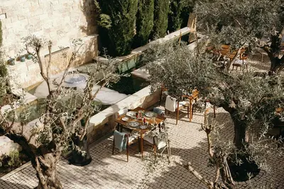 an overhead view of a table and chairs and trees at Eleven, Boutique luxury house & garden in Boliqueime