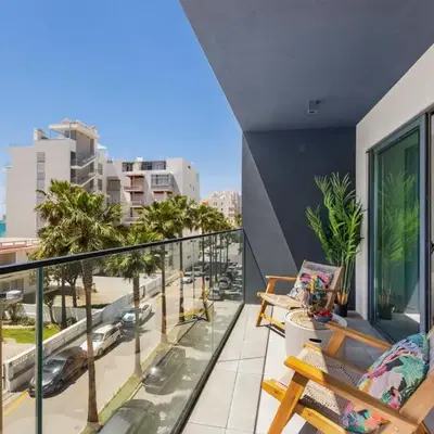 Stylish Modern Beachside Apartment with Pool & Seaview