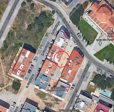 a map of a suburb with a red circle at A Santo, Quarteira - By Urbinvest Algarve in Quarteira