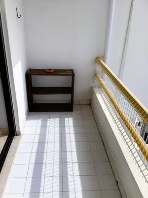 a small room with a floor with white tiles at 1 Bedroom Apartment Chaves, Praceta Vitorino Nemesio, Albufeira in Albufeira