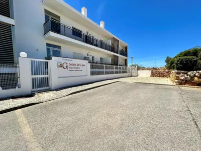 an empty street in front of a building at Albufeira Terrace With Pool by Homing in Albufeira