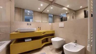 a bathroom with a sink and a toilet at Forte Novo Beach in Quarteira
