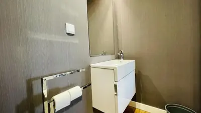 a small bathroom with a sink and a mirror at Prime by Check-in Portugal in Albufeira
