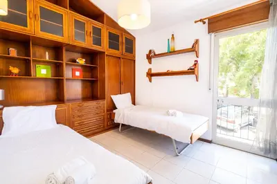 a white kitchen with white cabinets and a sink at #047 Families Only - Almond Tree by Home Holidays in Albufeira