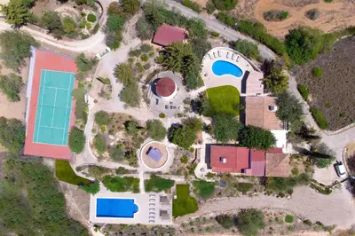an aerial view of a house with a pool at Quinta Molinum Ad Mare in Boliqueime