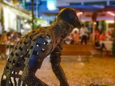 a statue of a dog wearing a hat at In Downtown - Villa Serenity in Albufeira