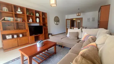 a living room with a couch and a table at Casa Old Town Splendida in Albufeira