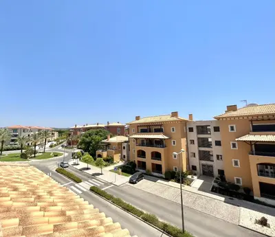 a view of a city street with buildings at Victoria I - Vasco da Gama by HD PROPERTIES in Vilamoura