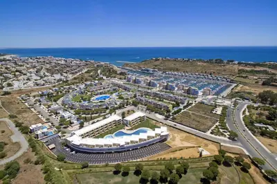 an aerial view of a resort near the ocean at Villa Alegre by Villa Plus in Albufeira