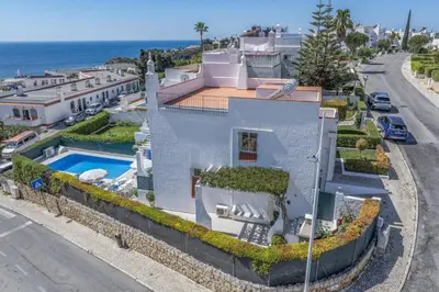 an aerial view of a city and the ocean at Villa Alegre by Villa Plus in Albufeira