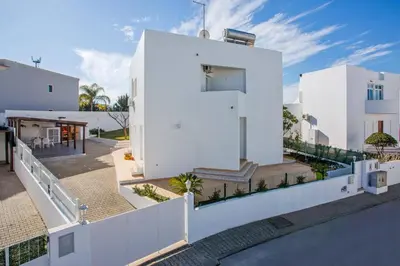 an aerial view of a white house at Villa Leonor by Villa Plus in Olhos de Água