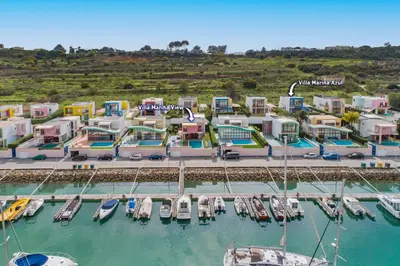 an aerial view of a marina with boats in the water at Villa Marina View by Villa Plus in Albufeira
