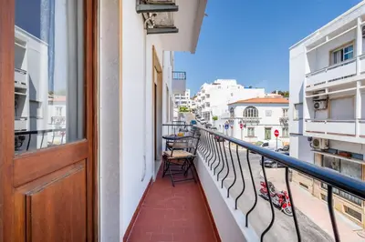 a balcony with a view of a street at Ténis Mar E in Albufeira
