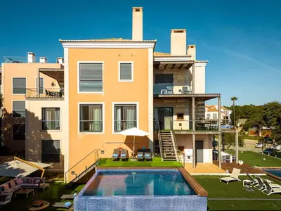 a house with a swimming pool in front of it at Algarve Vale Lobo Golf&Beach with Private Pool I in Vale do Lobo